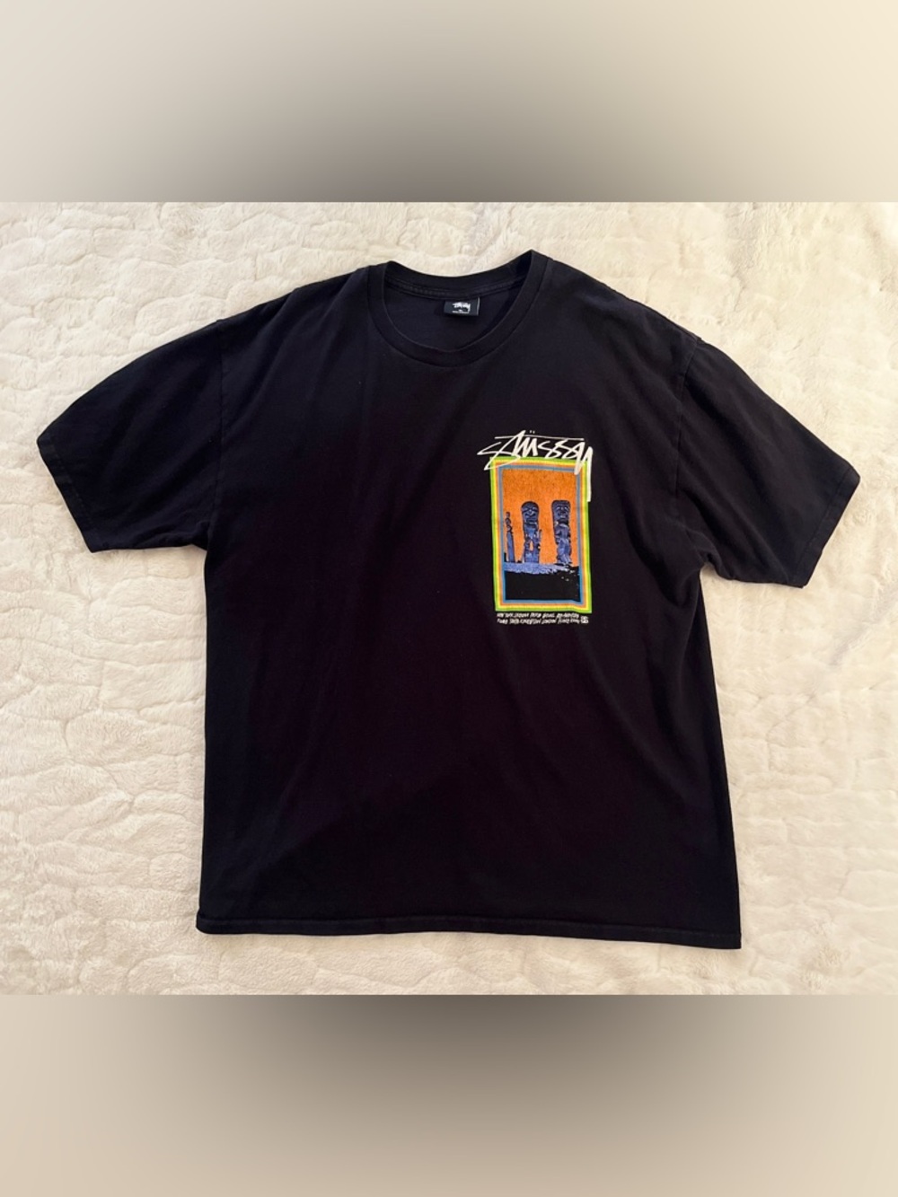 Stüssy Tiki t-shirt featuring a colorful Moai graphic print size XL
